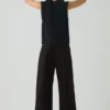 Pantalon en coton et laine à chevrons avec plis sur le devant