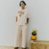 Pantalon en coton à plis sur le devant