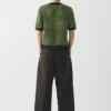 Pantalon en coton teint en pièce avec plis sur le devant