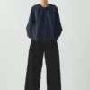 Pantalon en denim à plis sur le devant