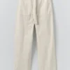 Pantalon en sergé de coton avec ceinture