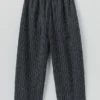Pantalon à jambes évasées en lin et coton rayé