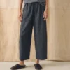 Pantalon à jambes évasées en lin et coton rayé