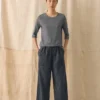 Pantalon à jambes évasées en lin et coton rayé