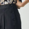 Shorts en sergé de coton à plis sur le devant