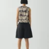 Shorts en sergé de coton à plis sur le devant