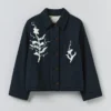 Veste à appliqués vert pois