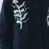 Veste à appliqués vert pois